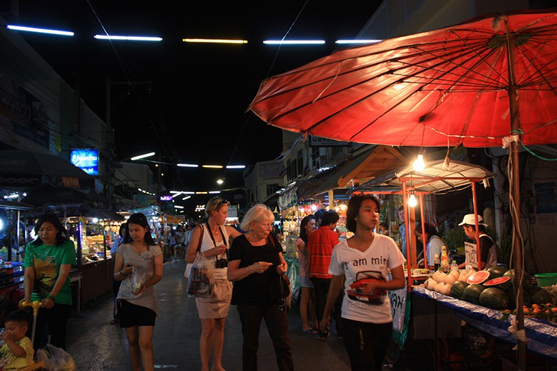 Fluorescent lamps are hang above the street as public light　Thailand Bankok
